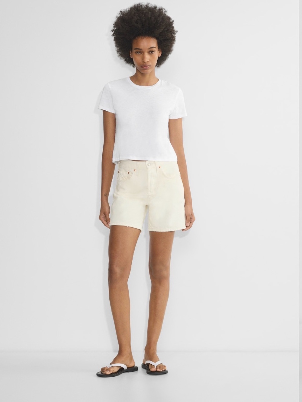 Levi’s High-Rise Cream Denim Shorts